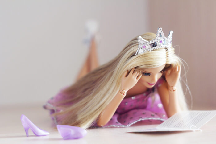 Barbie Laying and Reading with her Tiara