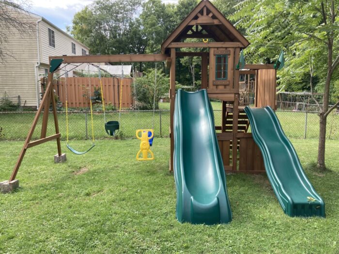 outdoor wooden swing and double slide play set