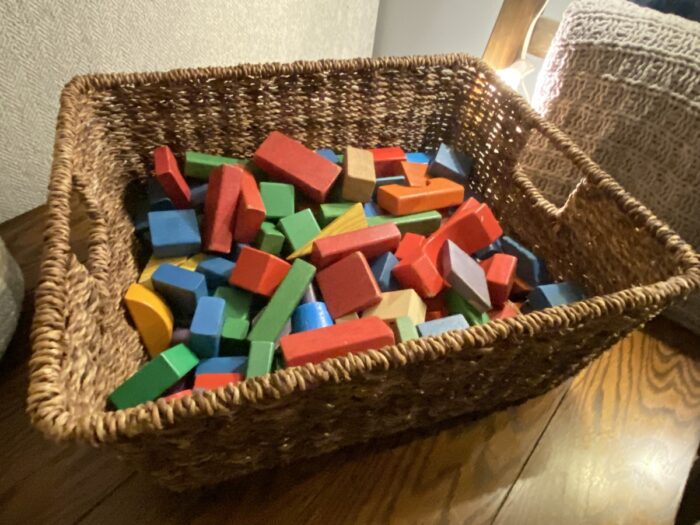 basket full of wooden blocks