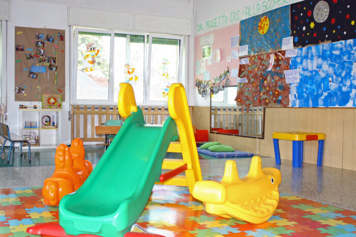 Indoor slide and other play items in a classroom
