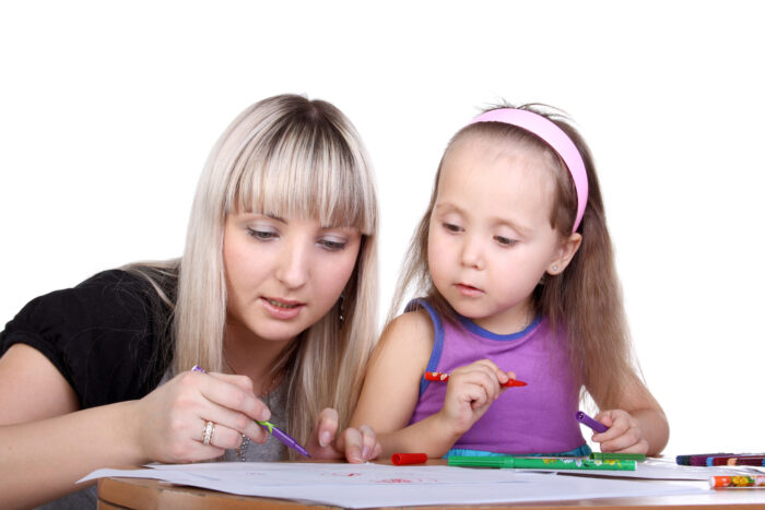 Mom Helping Her Daughter Write Her Name